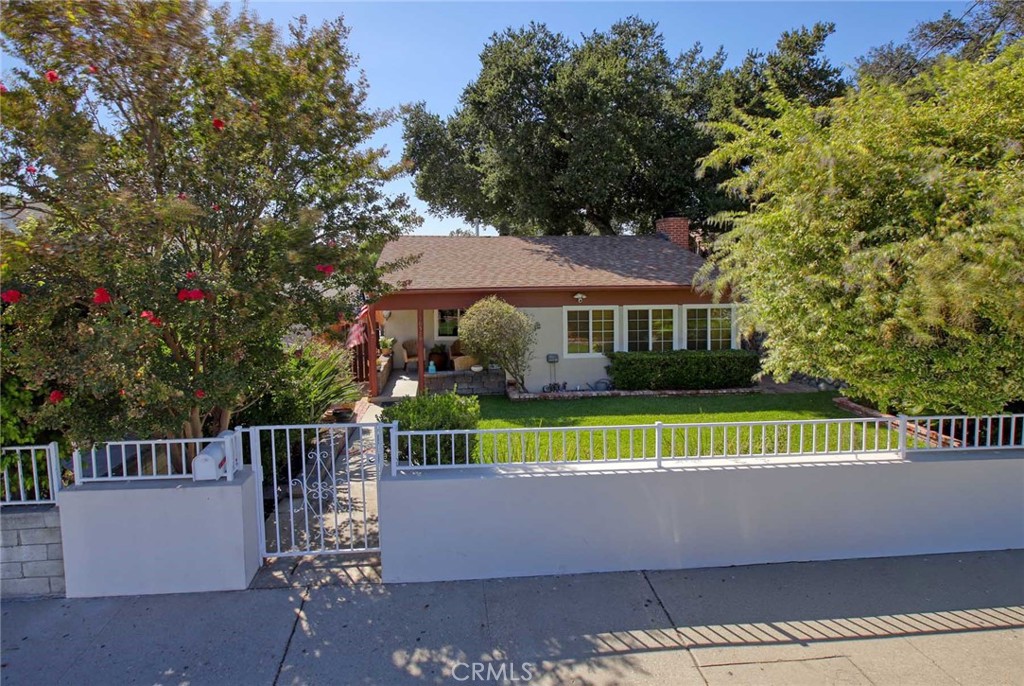 Charming 3-Bedroom, 2-Bath Single-Level Home
Welcome to this beautifully maintained single-level home featuring an inviting manicured front yard and welcoming porch. Inside, you’ll find gleaming hardwood floors, a cozy fireplace in the living room, and a tastefully renovated kitchen and bathrooms.
The property extends all the way through to Greenburn Street, offering convenient rear access and parking for several cars. A spacious 2-car garage with laundry facilities adds practicality and storage options.
This home combines comfort, character, and convenience — ready for you to move in and enjoy!