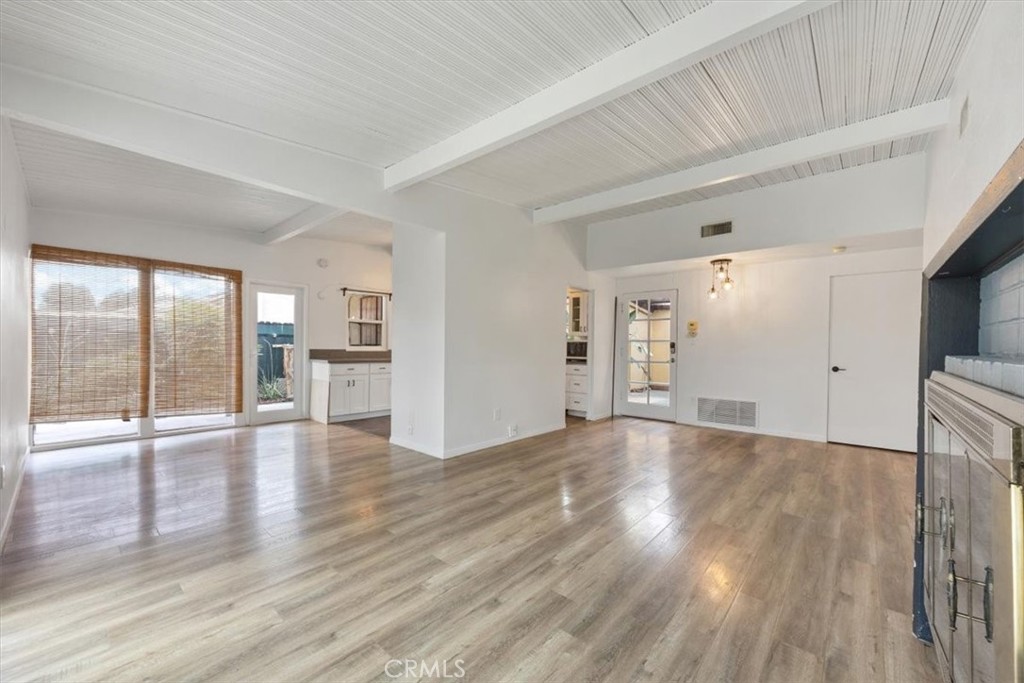 Welcome to this delightful 3-bedroom, 2.5-bathroom home located in Reseda. Spanning approximately 1,276 square feet, this residence offers a comfortable and inviting living space with a variety of modern features.
The heart of the home is the bright and airy kitchen, featuring crisp white cabinetry, sleek countertops, and stainless steel appliances, including a refrigerator, dishwasher, and microwave. The adjacent laundry area is equipped with a washer and dryer and ample shelving for storage.
The living spaces are finished with durable and stylish wood-style flooring and a clean, white color palette. Large windows with classic shutters fill the rooms with natural light and offer pleasant views of the outdoor areas.
One of the standout features of this property is the expansive and private backyard. The space boasts a large patio area perfect for outdoor dining and entertaining, as well as a well-maintained artificial turf lawn that requires minimal upkeep. Mature trees provide natural shade, creating a serene and private oasis.
This home also includes a two-car garage, providing secure parking and additional storage.
Located in a desirable Reseda neighborhood, this home offers a perfect blend of comfort and convenience. Don't miss the opportunity to make this your new home!
