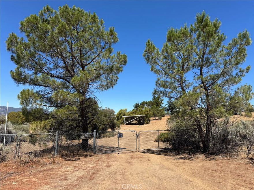 Sprawling 4.09-Acre Horse Property with Stunning Views and Modern Comforts

Welcome to your dream rural retreat! This spacious 5-bedroom, 2-bath manufactured home offers 1,848 square feet of comfortable living space with a bright, open floor plan. Enjoy the expansive living and family rooms, freshly painted interiors, new vinyl flooring, and energy-efficient UV windows.

Situated on 4.09 acres of all-usable land, this south-facing home sits atop a gentle slope, offering breathtaking panoramic views of the surrounding mountains and valley. A large front patio is perfect for soaking in the scenery or entertaining guests.

This animal lover’s paradise is fully fenced and packed with amenities, including:

 • Full arena with 4 gates

 • 4-stall mare motel

 • 2 covered pipe corrals

 • Separate calving corral

 • Multiple storage sheds

 • Interior hard steel fencing enclosing 2 acres

There’s plenty of room to bring your horses, goats, donkeys, chickens, dogs, cats, rabbits—and more. Plus, with miles of nearby trails, it’s perfect for equestrian enthusiasts and outdoor adventurers alike. There’s also ample space to park and store your RV, boat, or recreational toys.

Located just minutes from local amenities, including a casino and town center—this property blends peaceful country living with everyday convenience.

Don’t miss out on this rare opportunity to own a versatile, move-in ready slice of paradise!