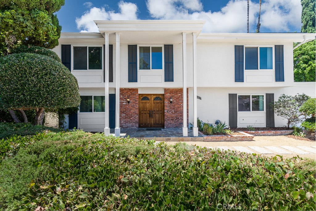 Tucked at the end of a quiet cul-de-sac and framed by hillside scenery, this spacious two-story lease offers fresh updates, scenic views, and a private pool — all on an oversized 18,694 square foot lot.
Inside, the home has been refreshed with new luxury vinyl plank flooring, updated fixtures, and interior paint throughout. The layout includes a formal living room with fireplace, a separate dining room with built-in china cabinet, a family room with backyard access, and an updated kitchen featuring granite countertops, stainless steel appliances, a center island cooktop, and double wall ovens. Large windows bring in abundant natural light and views of the surrounding hills.
Upstairs are five well-sized bedrooms, including a primary suite with dual closets and a newly remodeled bathroom with double sinks and a glass-enclosed shower.
The backyard is a peaceful, private setting with a large swimming pool, generous patio space, and built-in bench seating around a firepit. Mature trees offer privacy while the backdrop opens to hillside and canyon views, with no direct rear neighbors in sight.
Additional highlights include solar panels for energy efficiency, central HVAC, an attached two-car garage, and a wide driveway for additional parking. Located near parks, trails, and highly regarded neighborhood schools, this home offers a blend of comfort, space, and nature just moments from everyday amenities.
6427 Dunlo Place offers classic curb appeal, modern comfort, and a view-rich setting that rarely becomes available for lease.