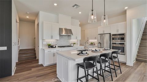 Photo of 27313 Black Walnut Place, Valencia, CA 91381 (MLS # OC26096651)