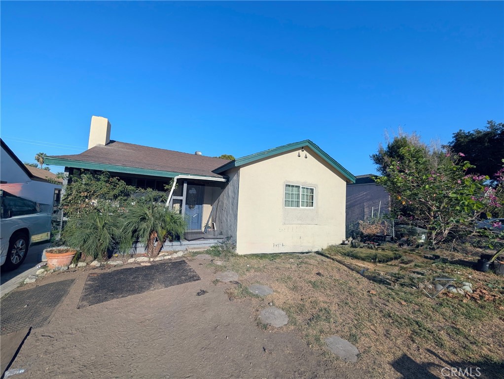This charming Four-bedroom, one-bathroom home in San Bernardino offers a perfect blend of historic character and modern convenience. Built in 1940, the 1,181-square-foot home sits on a 7,008-square-foot lot, providing ample space for outdoor enjoyment. Step inside to find wood-style vinyl flooring throughout, creating a warm and inviting atmosphere. The living room features a fireplace, adding a cozy touch for cooler evenings. The kitchen boasts a breakfast nook with built-in bench seating, ideal for casual dining or morning coffee. The detached garage offers plenty of space and ADU potential. The backyard is perfect for growing fruit trees and making it truly your own. This home offers plenty of space to host family events and gatherings. Located in a well-established neighborhood, this property is close to local amenities, parks, and schools.