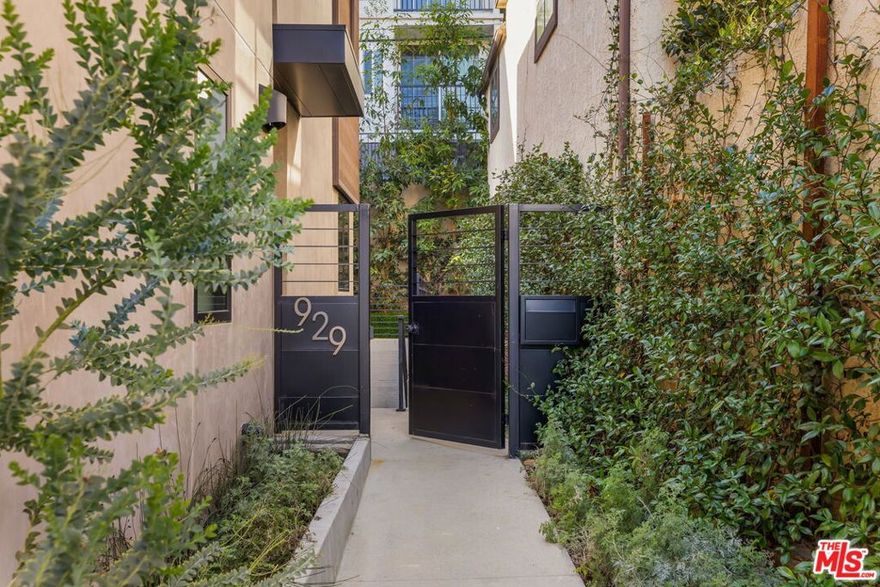 Experience luxurious living in the heart of West Hollywood's prestigious Norma Triangle neighborhood within this stunning contemporary residence. As part of a collection of nine singular residences designed by renowned ANR Signature, these new builds offer a modern take on urban living, complete with private rooftop decks boasting breathtaking views of the city skyline and downtown. As a rare offering this is a three bedroom home, with direct access from the third bedroom/office. A masterpiece of modern living,  inside this double gated residence, discover meticulously designed interiors with high ceilings and premium finishes throughout. Behind those double walk gates, the Courtyard home features a specimen tree outdoor full private courtyard with a dine in eating experience, flexible spaces including a family room with a fireplace and half-bath. The kitchen is equipped with top-of-the-line Miele appliances, complemented by European Oak cabinetry and honed concrete and oak flooring. The spacious primary bedroom features a fully built out walk in closet,  a luxurious bathroom with a spa-like wet room, high ceilings and ample natural light. Smart home technology ready adds ease.  Enjoy your own private rooftop deck, perfect for entertaining or enjoying quiet evenings overlooking the city. The home also features a direct access two-car garage. Situated moments from the Sunset Strip, West Hollywood Park, Pacific Design Center, and the vibrant Melrose shopping district, residents enjoy easy access to the best dining, retail, and entertainment options the area has to offer. West Hollywood Elementary School is also nearby.