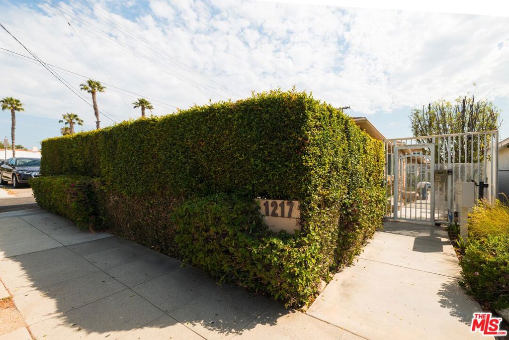Positioned in an unbeatable location between Santa Monica Blvd and Wilshire Blvd, this meticulously maintained end unit alcove studio offers a prime living experience. Situated in an intimate five-unit building, convenience is at your doorstep with proximity to grocery stores, restaurants, coffee shops, and public transportation. The unit features a private patio off the kitchen, perfect for dining or simply unwinding. The bathroom boasts a new shower, and the thoughtful design includes two closets for ample storage - one in the alcove and another conveniently located in the hallway. One parking spot is provided. Don't miss this opportunity to reside in the heart of it all.