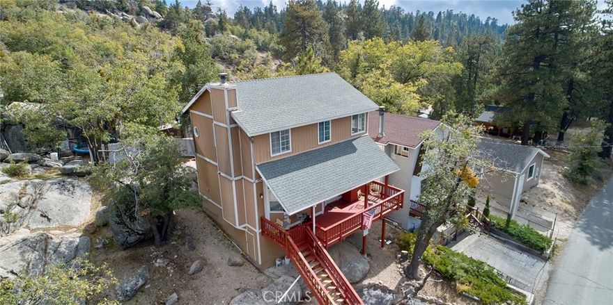 Welcome to 33361 Carlock DrThis spacious 2 bed, 2 bath home in Arrowbear is ready for its next owner. A major upgrade has already been taken care of with a NEW roof installed in Summer 2022, giving peace of mind for years to come. The home offers a bright, open layout and the comfort of mountain living, all just 20 minutes from Highland and Yaamava’ Casino. Access is easy — while the front has more stairs, you can simply enter through the back with only 6 steps to the door. The neighborhood is another highlight, with super friendly neighbors who look out for one another, creating a true sense of community.