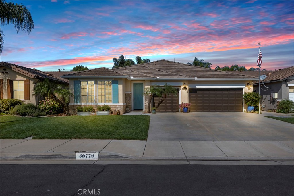 Welcome to this stunning Woodside-built, highly upgraded single story home in the Menifee Ranch community of Menifee offering 2,588 sq. ft. of beautifully upgraded living space on a 7,405 sq. ft. lot. Built in 2002, this home blends timeless design with modern comfort & is truly turnkey!
Step inside through the elegant arched foyer & discover a thoughtfully designed open floor plan. The home features 4 bedrooms & 2 full baths, including a split layout that provides privacy for the spacious primary suite. Enjoy multiple living spaces, including a formal dining room with Tuscan old-world finished drywall creating an elegant dining experience, a living room with arched details & a game room/additional family room with built-ins & abundant natural light through the large sliding doors leading to your backyard paradise!
The upgraded kitchen is the centerpiece of the home, complete with an expansive island, breakfast bar, quartz countertops, custom backsplash, and a wine bar—perfect for entertaining. Additional highlights include LVP and tile flooring throughout, built-in media niches and bookcases, surround sound, a Nest thermostat, and a new HVAC system and heat pump installed in 2024.
The primary suite has been fully renovated to provide a spa-like retreat with a walk-in tile shower featuring dual shower heads, a dual sink vanity with beautiful lighting and a custom dream closet with built in shelving for optimal storage and organization.
Step outside through the game room to your private entertainer’s backyard. A fully equipped outdoor kitchen features a 5-burner BBQ, sink, and ice tub. Enjoy the expansive patio cover with ceiling fans and sun screens, a stained concrete patio, and low-maintenance artificial turf with a 4-hole putting green, all surrounded by mature landscaping.
The 3-car garage offers epoxy flooring, storage racks & direct access to the backyard.
Tastefully upgraded laundry room matches the kitchen upgrades & offers built-in cabinets for ample storage and sink for added convenience.
Solar system to help energy efficiency & offset the cost of living.
All of this is located in the Menifee Ranch community with low HOA, in the heart of Menifee (one of California's fast growing cities), near the Menifee Town Center, shopping, amenities, close to schools, parks & the popular Gale Webb Sports Park.
This property embodies pride of ownership & is truly a home inspector’s dream—offering style, upgrades & comfort at every turn.