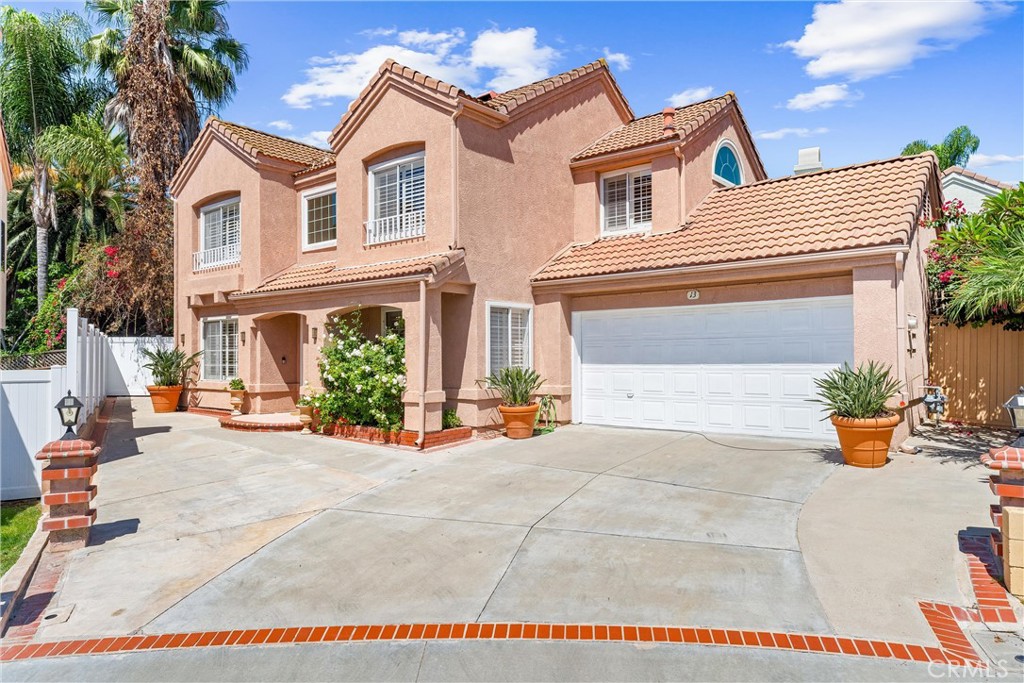 EXCEPTIONAL CUL-DE-SAC LOCATION WITH AN EXTRA-LONG DRIVEWAY AND A TRUE 4-BEDROOM SINGLE FAMILY HOME IN CALIFORNIA REFLECTIONS! This beautifully remodeled residence features an expansive open-concept layout combining the family and living rooms into a spacious great room, complemented by a separate formal dining area—perfect for entertaining and everyday living. The chef-inspired kitchen showcases upgraded stainless steel appliances, Tile flooring downstairs, hardwood-style flooring throughout upstairs and includes a washer and dryer, plus a bonus refrigerator in the garage.
Upstairs, the oversized primary suite boasts soaring vaulted ceilings, a wall-to-wall mirrored closet, and a fully remodeled en-suite bath with a frameless glass stone shower, dual-sink stone vanity, designer fixtures, and an abundance of natural light. A generously sized secondary bedroom and a full upstairs hall bath add comfort and convenience, along with a large main-level powder room.
Additional highlights include upgraded dual-pane windows and sliding glass doors, plantation shutters, enhanced baseboards and window casings, and stylish lighting fixtures throughout. Step outside to your private backyard retreat featuring an inviting patio, lush planters, seating walls, and a large side yard—ideal for outdoor living. The deep driveway and well-manicured curb appeal enhance the exceptional charm of this home. Complete with built-in garage storage and epoxy floors, this is a must-see property in one of the most desirable pockets of Aliso Viejo!