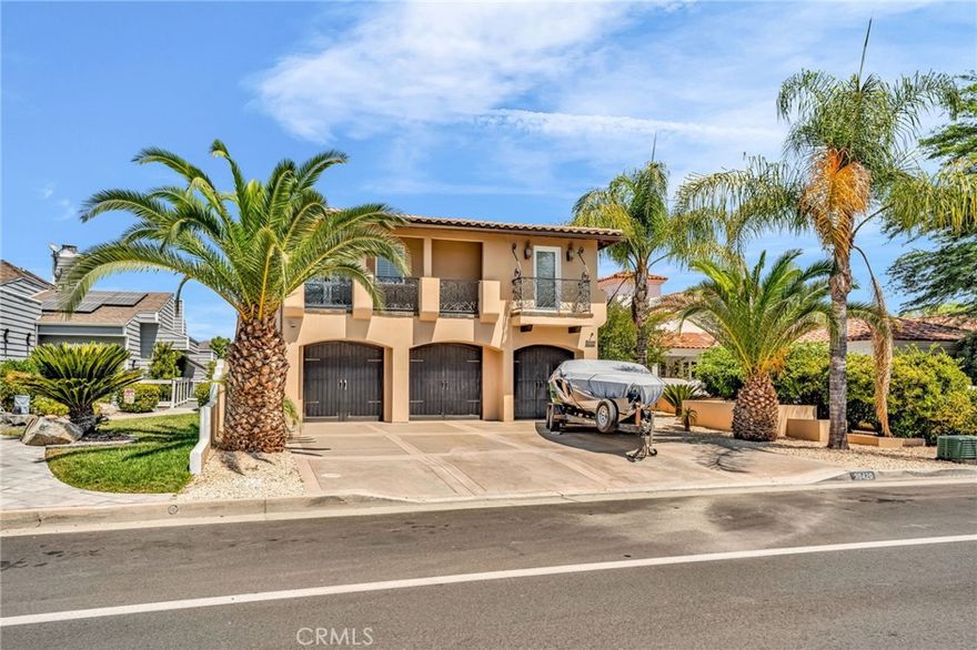 Welcome to 30420 Longhorn Drive, a stunning east-facing waterfront masterpiece located in the prestigious guard-gated community of Canyon Lake, CA. Perfectly positioned on the serene waters of Catfish Cove, this residence offers refined lakefront living with breathtaking panoramic views, exceptional design, and world-class amenities. Spanning an impressive 3,811 sq ft on a 6,098 sq ft lot, this home features a grand open floor plan adorned with soaring ceilings, travertine flooring, and designer finishes. The gourmet kitchen is a chef’s dream, complete with a large center island, Viking appliances, wine cooler, and spacious walk-in pantry—a perfect balance of function and elegance. The luxurious master suite is a true private retreat, offering sweeping lake views, a cozy sitting area, private patio, in-suite fireplace, dual walk-in closets, and a spa-like ensuite with jacuzzi tub and oversized glass shower. Outdoor Living at Its Finest-The resort-style backyard is an entertainer’s paradise, featuring an infinity-edge pool and spa with cascading waterfalls, multiple seating areas, and a private patio with built-in entertainment center. Enjoy a sandy beach area, large palapa, fire pit, and a covered u-dock with hydro lift—ideal for boating, paddleboarding, or simply soaking in the lakefront tranquility. From the moment the sun rises over the water to the peaceful glow of evening, this property offers front-row views of majestic water and mountain vistas, fostering a daily sense of serenity and elevation. Designed for both grand entertaining and intimate moments, it seamlessly blends luxury and comfort. In the celebrated Canyon Lake community—renowned for its privacy, safety, recreational amenities, and natural beauty—this home is more than a residence; it’s a lifestyle. Whether hosting unforgettable gatherings or enjoying quiet reflection by the water, 30420 Longhorn Drive is truly one-of-a-kind.
