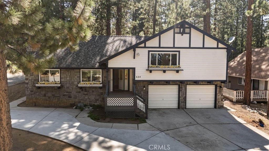 Welcome to your mountain retreat in the highly sought after Winterpark neighborhood of Big Bear Lake! This beautifully maintained 3-bedroom, 4-bathroom home offers the perfect blend of comfort, functionality, and unbeatable location. Ideally situated right between Snow Summit and Bear Mountain ski resorts, you're also just minutes from the lake, the Village, the Big Bear Alpine Zoo, and the golf course, truly the best of Big Bear at your fingertips.
Step inside to a bright, airy interior that flows effortlessly from room to room. Natural light fills the living spaces, creating a warm and inviting atmosphere perfect for entertaining or relaxing after a day of adventure.
Outside, the expansive yard provides plenty of space for gatherings, gardening, or simply enjoying the mountain air. There's no shortage of storage, and the oversized garage can accommodate up to four vehicles, a rare find in Big Bear! A newer roof offers peace of mind and adds to the home's overall value.
Whether you're looking for a full-time residence, a vacation home, or an investment property, this Winterpark gem checks all the boxes.