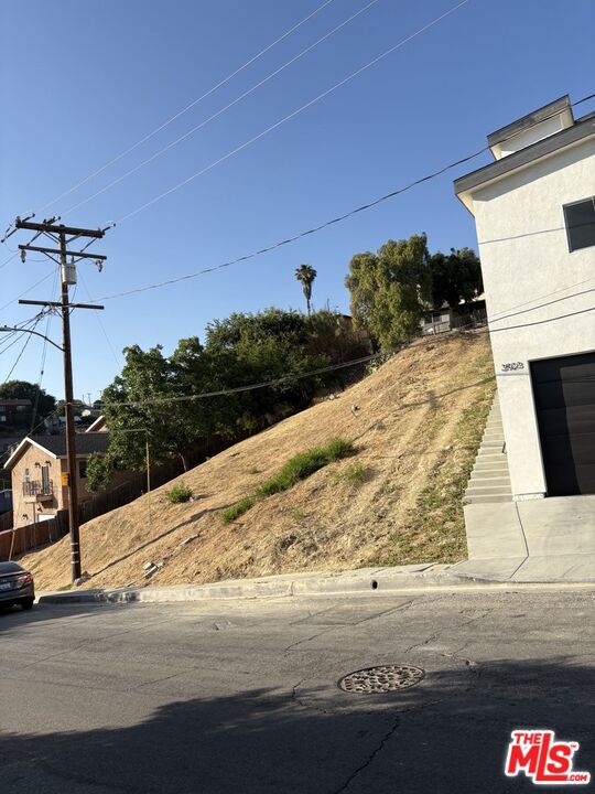 This expansive vacant lot, nestled in the charming community of City Terrace, offers you the opportunity to build your dream home with stunning city views. Located on an established street, the lot comes equipped with access to utilities and a nearby sewer line, streamlining the development process. Enjoy the proximity to City Terrace Park, El Mercadito, and El Tepeyac Cafe, as well as quick access to various elementary schools, East Los Angeles College, Cal-State LA, and DTLA. Seize the chance to create your ideal living space in this convenient and vibrant neighborhood!
