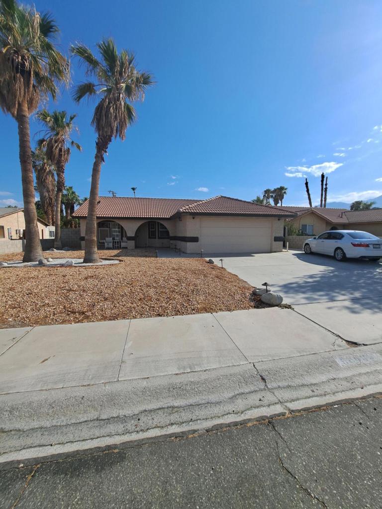Don't miss this Great Opportunity. Unique property DO NOT BE FOOLED BY THE OUTSIDE LOOKS..... Completely Updated and remodeled inside. TWO HOUSES in One. Yes TWO houses. Main house has 3 bedrooms 2 bathrooms and the Second house is 2 bedrooms 2 baths with a full kitchen. This HOME is Perfect for a large Family or 2 Families Renting Together . This property has a pool and spa in the middle of the Houses with a beautiful Mountain view. Save on electric bill this property has SOLAR PANELS.