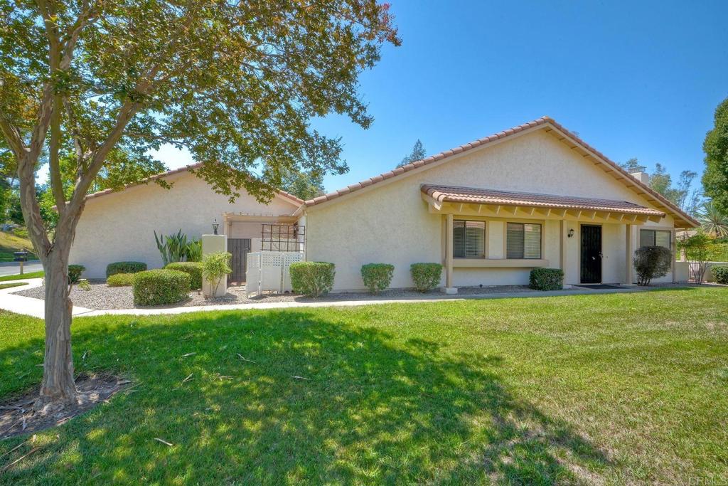 Prime location in the sought-after Oaks North Villas — a 55+ active adult golf course community! This single-story end-unit condominium lives like a detached home, with vaulted ceilings and no one above you, creating a bright, open, and private feel. As you enter, you’ll appreciate how natural light fills the family room and kitchen. The back patio is perfect for entertaining or relaxing, offering a park-like setting that overlooks the greenbelt and community grassy area. Additional highlights include indoor laundry, direct access from the one-car attached garage, newer HVAC, newer carpeting, and a new refrigerator, washer, and dryer. The primary bedroom features cathedral ceilings, a large walk-in closet, and its own private patio. The upgraded primary bathroom offers a newer vanity and a step-in shower with a custom tile surround. Conveniently located between the Rancho Bernardo Winery and the Oaks North Golf Course, this home also gives you access to the Oaks North Community Center, which offers swimming, pickleball, tennis, and many other activities. This beautiful home is a must-see!