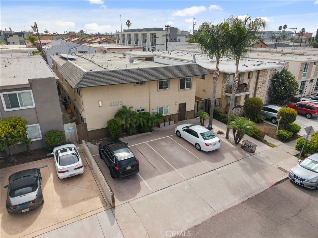Move-in-ready North Park San Diego condo awaits! This stunning 2-bed, 2-bath main-floor gem offers effortless living for all ages. Minutes from the San Diego Zoo and walking distance to the vibrant 30th St. and University Ave dining and arts scene. Enjoy a bright, open layout with sleek laminate flooring, abundant natural light, and recessed lighting. The upgraded kitchen boasts granite countertops, plenty of cabinet space, and a cozy adjacent dining area. Both bathrooms have been remodeled and show very well. There is an in-unit laundry room for convenience. The community park is right across the street to take your kids out to play or simply get some outdoor exercise. The elementary school is blocks away. If you're looking for convenience, comfort and a great atmosphere this is a condo you have to see!