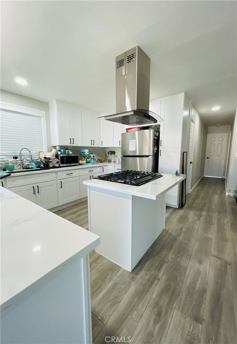 Photo of 11250 Ramona Ave #115, Montclair, CA 91763 (MLS # SW26067732)