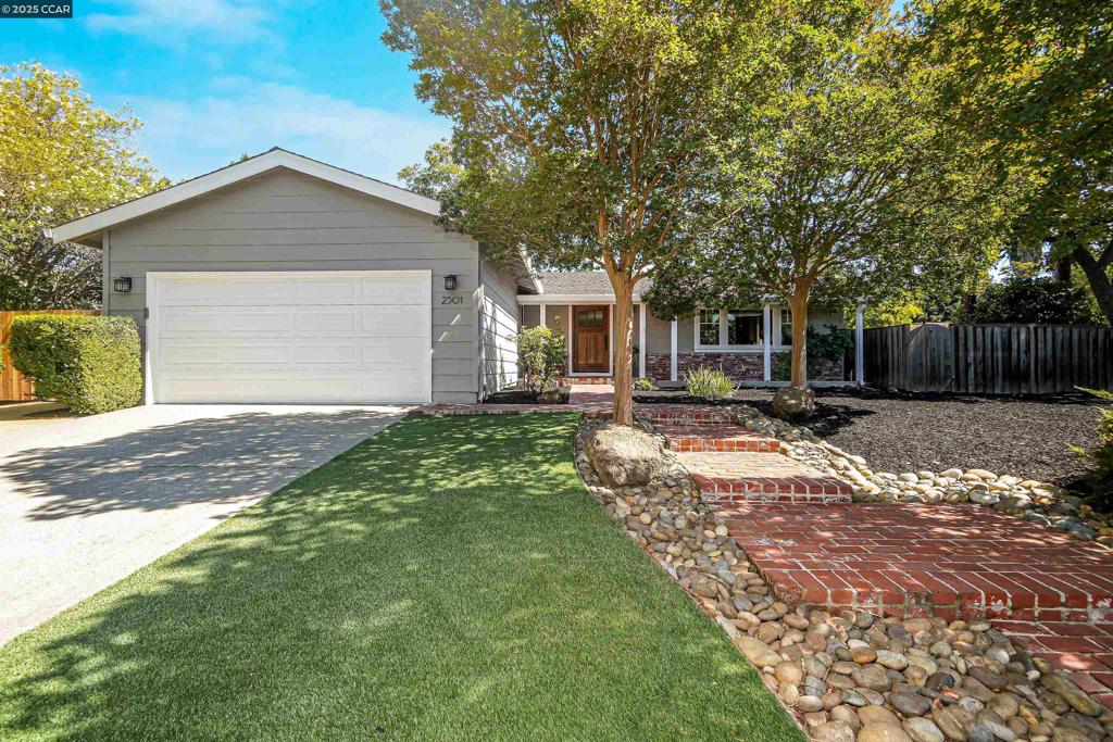 Prepare to fall in love. This beautifully reimagined Walnut Creek home delivers the open, airy living space everyone dreams of. In 2008, walls came down and the home was reborn—turning a series of separate rooms into one spectacular great room where light pours in from expansive windows and life flows seamlessly from kitchen to living to dining. The heart of the home is a chef-inspired kitchen with custom cabinetry, premium appliances, and a layout designed for connection. The warm glow of a stone-surround gas fireplace sets the tone, while luxury vinyl plank flooring, recessed lighting, and built-in ceiling speakers create an elevated, yet comfortable vibe. Every detail has been thoughtfully done—from seismic shear walls for added safety to a replaced roof for peace of mind—all completed under City of Walnut Creek permits. Outdoors, you’re minutes to parks, trails, top-rated schools, and the best of downtown. This isn’t just a remodel. It’s a transformation. And it’s waiting for you.