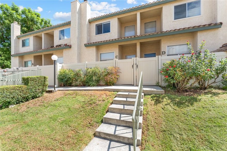Step into modern comfort with this stylish 2-bedroom, 2.5-bath condo offering just over 1,500 sq ft of thoughtfully designed living space. The home has been refreshed with newer flooring, paint, and upgraded appliances, giving it a clean and contemporary feel from the moment you walk in. The main level features a welcoming living room with a cozy fireplace, a spacious dining area, and a versatile loft-style space overlooking the living room—perfect for a home office or study. Upstairs, both bedrooms are generously sized, including a private primary suite with its own attached bath. Enjoy the convenience of a 2-car attached garage with laundry, plus a private patio area right outside your front door—ideal for a small garden or relaxing outdoor space. The community is beautifully maintained with mature landscaping and offers a pool and spa just steps away. Located in highly desirable South Redlands, this condo puts you within walking distance of schools, restaurants, public transit, and just blocks from ESRI.