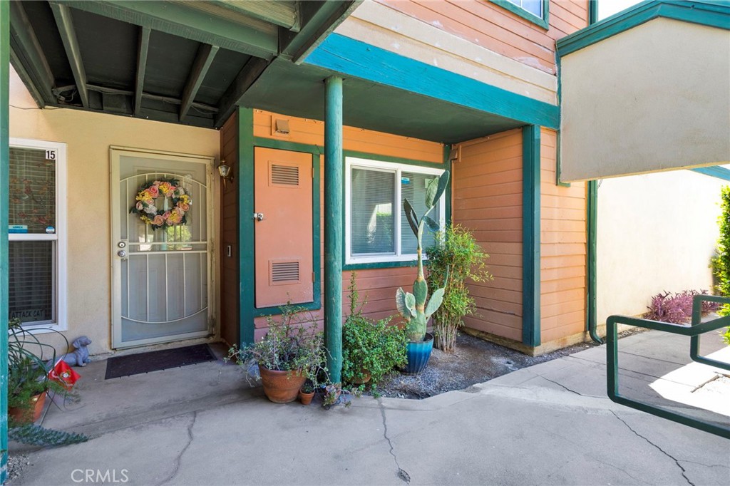 Located just minutes from Cal State San Bernardino and with quick access to the 215 freeway, this charming 1-bedroom, 1-bath home is perfect for first-time buyers, students, or investors. A fully renovated kitchen features updated countertops, cabinets, and appliances for move-in-ready convenience. A stylish entryway welcomes you into a bright space with laminate flooring—no carpet here! Enjoy your own private back patio with low-maintenance artificial grass, ideal for relaxing or entertaining. A brand-new HVAC system ensures year-round comfort. Plus, take advantage of the community amenities including a sparkling pool and soothing spa. With a prime location and thoughtful upgrades, this home is a rare find!