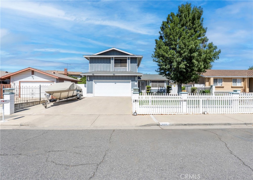 This spacious 4-bedroom, 2.5-bathroom pool home, set against breathtaking mountain views, offers the perfect blend of comfort and convenience. Best of all, there are no HOA fees! Ideally located just minutes from the lake, shopping centers, and schools, this home promises an unbeatable lifestyle. As you step inside, you'll be greeted by an expansive open floor plan, providing endless possibilities for both relaxing and entertaining. The second level features three generously sized bedrooms, while a fourth bedroom and full bathroom are conveniently located on the main floor—perfect for guests or multi-generational living. The open-concept kitchen seamlessly flows into the large family room, creating an inviting space for family gatherings or everyday living. Step outside and discover your own private backyard oasis, featuring a gated swimming pool and a spacious covered patio—ideal for hosting summer barbecues or simply unwinding in peace. Don't miss out on this incredible opportunity to own a home that combines spacious living, beautiful surroundings, and a prime location, all without the burden of HOA fees