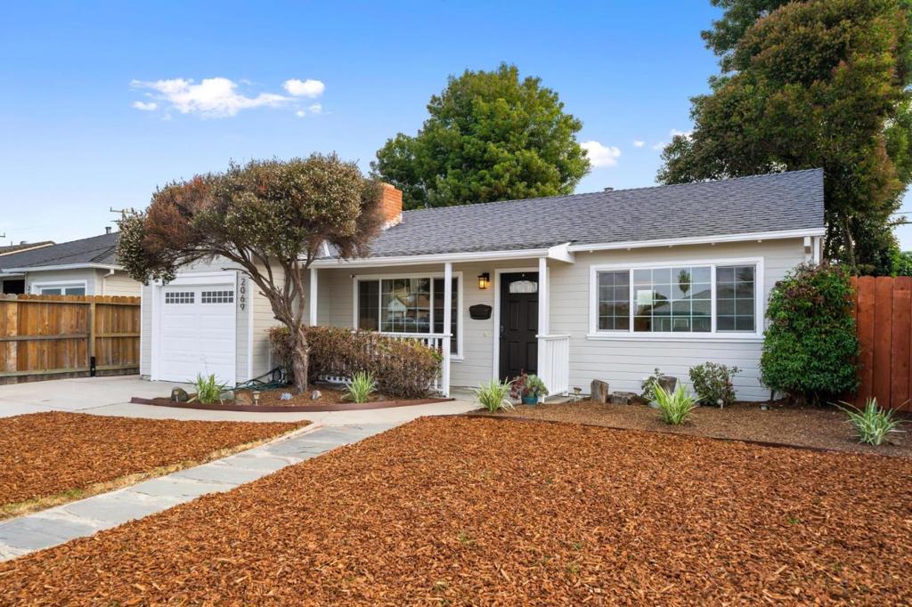 Assigned to the highly sought-after Aragon High School, this cherished home sits on an expansive flat lot with freshly painted interiors and exteriors and beautifully refreshed landscaping. It offers two spacious bedrooms plus a 120 sq ft detached office in the backyard, ideal as a home office, game room, or cozy media retreat. Enjoy endless possibilities to expand or add an ADU. Walk to Bayside/Joinville Park and nearby hiking trails. Conveniently located near Downtown San Mateo, major freeways, and local shops. This is the home you've been waiting for, make it yours today.