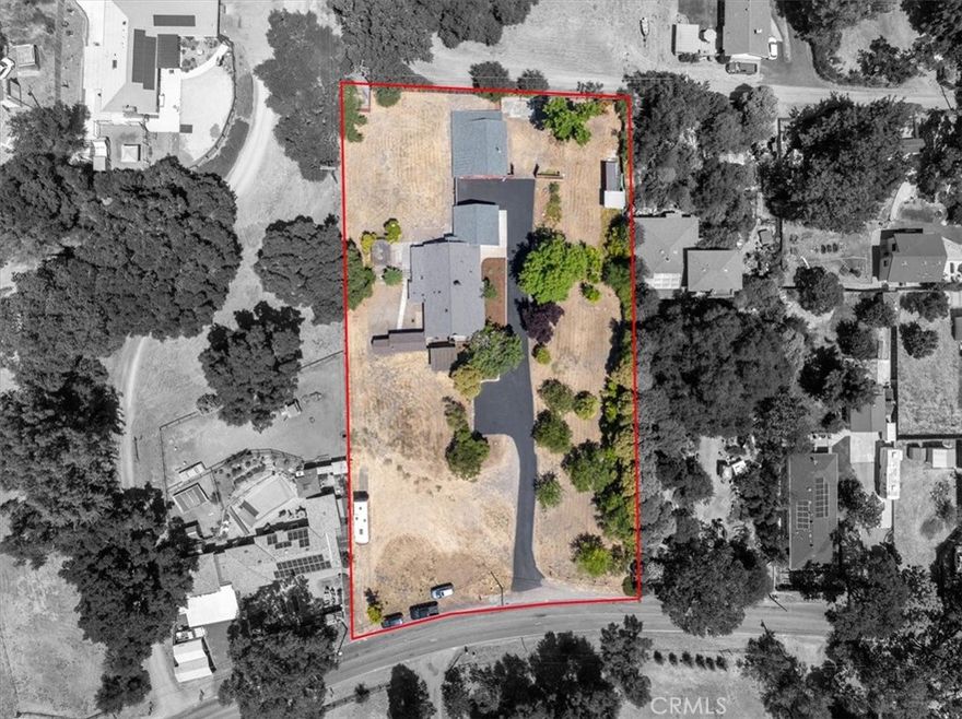 Looking for space, privacy, and a shop? This west side property checks every box. Set on approximately 1.35 acres of peaceful, usable land, this inviting home combines comfort, function, and flexibility in all the right ways. Inside, you’ll find a bright, open layout filled with natural light, warm bamboo floors, and a cozy wood-burning fireplace. It instantly feels like home.
The owners have done all the right updates, with fresh interior and exterior paint, new flooring, modern light fixtures, and beautifully updated kitchen and bathrooms. You can move right in and enjoy.
Just off the kitchen and primary suite, an enclosed porch adds about 475 sq. ft. of bonus living space (not included in the listed square footage). It’s the perfect spot for a home gym, art studio, playroom, or whatever you’ve been wishing you had a little more room for.
There’s even a large cellar accessible from the kitchen. This could be a great spot for a wine cellar, bourbon cave, or an extra pantry.
The property is laid out beautifully, with the home and shop tucked toward the back of the lot for added privacy. The shop is a true standout, offering multiple oversized doors and three separate work areas. There is plenty of space for projects, storage, or buyers may wish to explore ADU possibilities with the City of Atascadero (the layout offers great potential for that).
Outside, you’ll find a detached shed that could make a great art studio, playhouse, or garden retreat, plus several outbuildings and mature fruit trees including pomegranate, persimmon, and plum.
Recent upgrades like a newer roof, new AC unit (2025), new water supply piping (2025), and a new water heater (2025) mean you can enjoy comfort and peace of mind for years to come.
This west side gem truly has a little bit of everything—space, versatility, and a great setting. Don’t miss your chance to make it yours