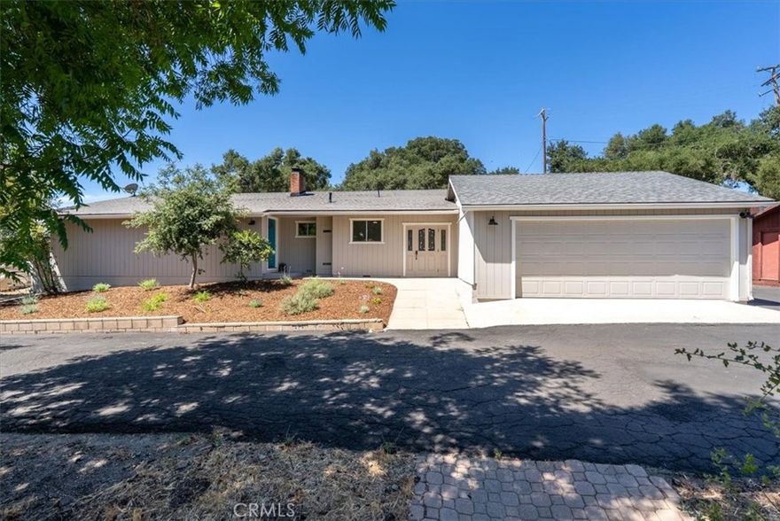 Spread out and relax in this turnkey west side home, set on approximately 1.35 acres with a spacious shop! Gather in the light-filled living and dining areas, featuring warm bamboo floors and a cozy wood-burning fireplace. Recent updates include fresh interior and exterior paint, new flooring, modern light fixtures, and beautifully updated kitchen and bathrooms.

An enclosed porch—conveniently located off the kitchen and primary bedroom—adds approximately 475 sq. ft. of versatile bonus living space (not included in the advertised square footage). This bonus space could be perfect for a home gym, office, craft room, game room, or any activity you need a little extra space for! Another unique feature is the large cellar, accessed from the kitchen, which could be great for wine storage or additional pantry space.

The mostly level, expansive lot, is thoughtfully laid out, with both the home and shop toward the back of the parcel for added privacy. The large shop offers excellent functionality, with multiple oversized doors, and three separate areas for added versatility. Buyers are encouraged to check with the City of Atascadero for possible ADU opportunities with this well-positioned unit. Additional features include a detached shed—perfect for an art studio or he/she shed—along with several outbuildings, and numerous mature fruit trees including pomegranate, persimmon, and plum. 

Other highlights include a large finished two car garage, a newer roof, new AC unit (2025), new water supply piping (August 2025), and new water heater (August 2025), providing comfort and peace of mind for years to come.

Don’t miss your chance to own this turnkey property with endless possibilities—it won’t last long!