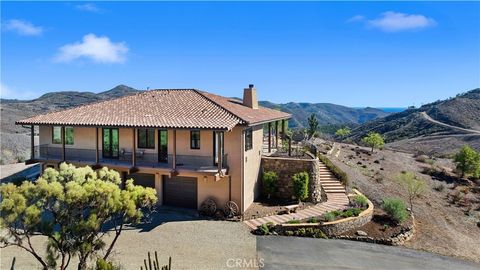 Photo of 8400 Mipolomol Road, Malibu, CA 90265 (MLS # PV26065932)