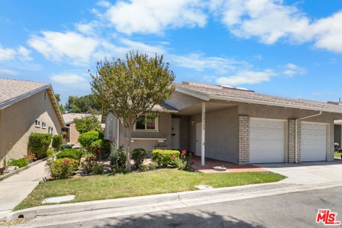 Photo of 26834 Avenue Of The Oaks #D, Newhall, CA 91321 (MLS # 26850441)