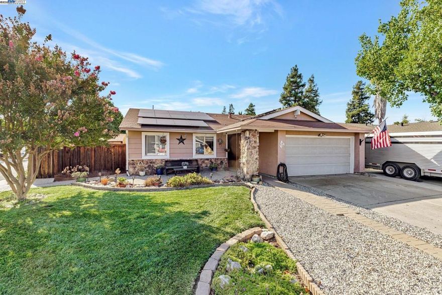 Welcome to your new home at 577 Rachelle St, a beautiful single-story, corner lot that's move-in-ready and waiting for you. This charming home is nestled on an oversized, 7,900+ sq ft lot in a highly sought-after neighborhood, offering a perfect blend of indoor comfort and outdoor living. Inside you will immediately notice the pride of ownership and attention to detail. The main living areas & bathrooms feature updated tile flooring, while the bedrooms offer beautiful luxury laminate flooring. The kitchen is a chef's delight, with modern canned lighting & plenty of space to create. Dual-pane windows and a whole-house fan ensure comfort & energy efficiency, complemented by HVAC system and an efficient fireplace insert for cozy evenings. Plus, the installed solar panels mean you can enjoy a greener, more cost-effective lifestyle. Step outside to discover your private oasis. The expansive backyard is a true entertainer's dream, featuring a covered patio with a spot for your TV, perfect for enjoying year-round barbecues and gatherings. The property also includes a charming gazebo and two sheds & several raised garden beds. With cemented and covered side yard access, convenience is key. This home offers an incredible opportunity to create lasting memories.