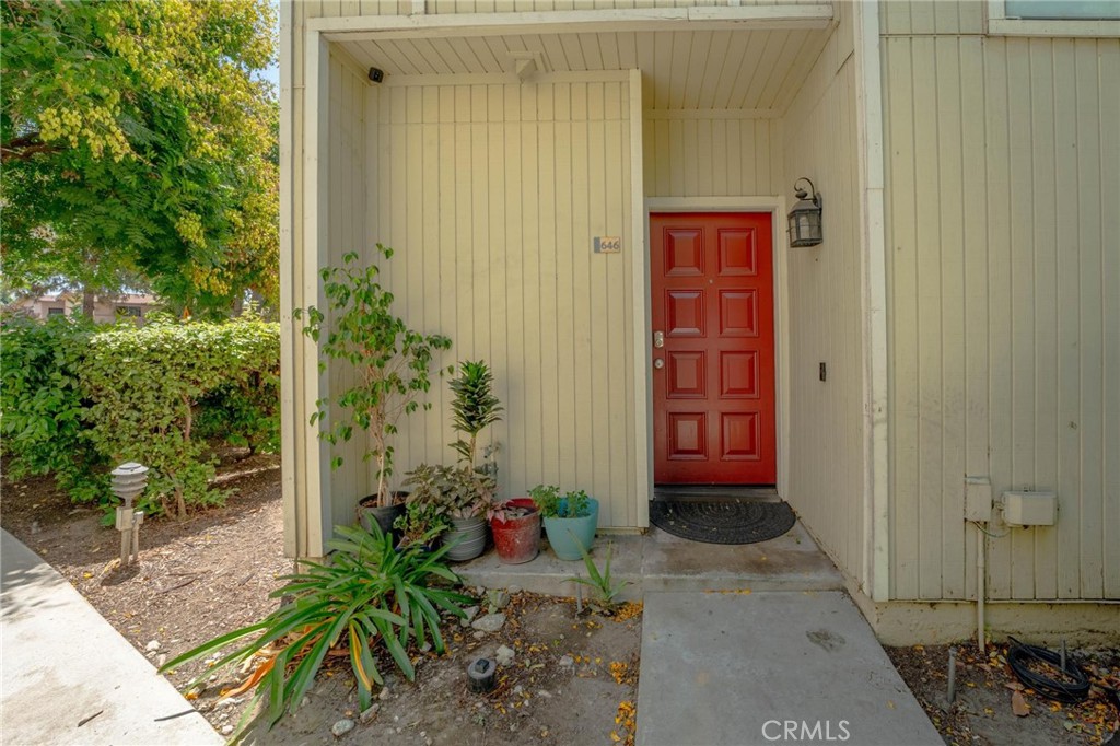 Welcome to The Brooks of Claremont! This beautifully updated end-unit condo is located in a highly desirable gated community, just minutes from the prestigious Claremont Colleges and Claremont Unified schools. Inside, you’ll discover the largest model offered at The Brooks, featuring a bright and open floor plan with luxury vinyl plank flooring, fresh neutral paint, recessed lighting, crown molding, updated baseboards, and a cozy fireplace. The spacious living room is enhanced by double sliding glass doors that flood the home with natural light and lead to a private patio—perfect for relaxing or entertaining. The modern kitchen is a true highlight with crisp white cabinetry, granite countertops, stainless steel appliances (stove, refrigerator, dishwasher, and microwave), recessed lighting, and a breakfast bar for casual dining. For added convenience, this home includes an indoor laundry room and a beautifully remodeled powder room downstairs. Upstairs, the expansive primary suite offers a large walk-in closet and tranquil views of the community pool. The hallway bathroom has been tastefully remodeled with Quartz countertops, dual sinks, new lighting, and an updated shower. A secondary bedroom provides comfort and versatility, ideal for family, guests, or a home office. Community amenities include a sparkling pool and spa, all within a beautifully maintained and secure gated setting. Additional highlights include a two-car detached garage, upgraded staircase, and countless other modern touches. With its prime location, location, location, this move-in ready home blends style, comfort, and convenience—just minutes from shopping, dining, parks, and top-rated schools in one of Claremont’s most sought-after neighborhoods.