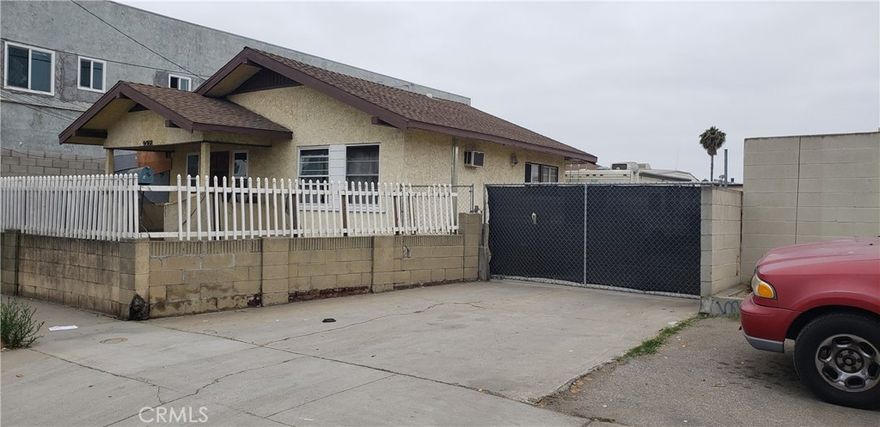 15,245 sf lot, 56 x 272, M1 zoning allows for multiple uses.  Current structure is a sfr with 3 bedrooms and two  baths.