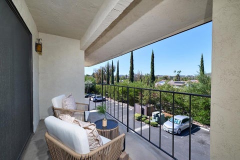 Photo of 17617 Pomerado Rd RD #210, San Diego, CA 92128 (MLS # 260024580SD)