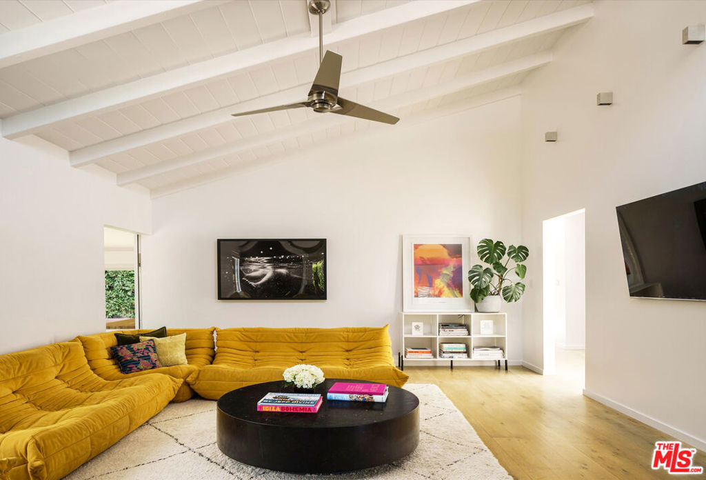 Nestled on a peaceful gated corner lot in the heart of Venice, this single level architectural home is the perfect blend of modern design and coastal California ease. With three bedrooms, two and a half bathrooms, a sparkling pool, and an additional attached studio - suitable for office, guests, gym, playroom or whatever your creative endeavor may be - the home offers space, style, and versatility in one of LA's most iconic neighborhoods.One of the first projects attributed to trailblazing designers Electric Bowery, the airy, open layout of the living room, dining room and kitchen - with incredible indoor/outdoor flow - lends itself to inspiration and joyful living. Skylights, clerestory windows and sleek Fleetwood sliders flood the space with natural light and open wide to the private outside spaces featuring a sparkling pool with built in spa, flat grassy yard, outdoor shower (with hot water!) built in outdoor kitchen island with Wolf grill, lovely fire pit area and a spacious al fresco dining deck. The airy kitchen feels like something out of a chefs dream with soaring ceilings, Bertazzoni, Bosch and Thermador appliances - and is designed for serious cooking, casual meals and lively gatherings. The primary bedroom suite features a bright, spa-like bathroom with double sinks, separate tub and shower and custom cabinetry and tile, plus direct access to the pool.This home is designed to make everyday living feel like a getaway. Minutes from Abbot Kinney's shops and restaurants, Culver City, Marina del Rey and the beach, you wont ever need to go far to live the life you have always imagined.