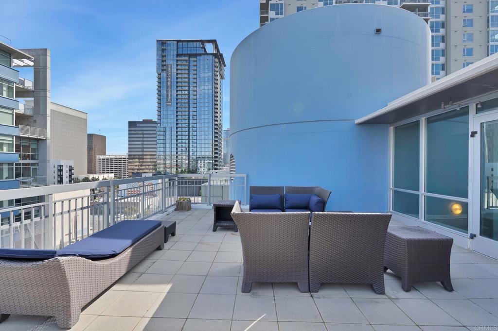 Private rooftop patio in Little Italy! Come see this unique 2 bedroom 2 bath plus den top floor unit at La Vita condos (mid-rise building on Union Street). Split bedrooms downstairs with a balcony. Upstairs is a loft area perfect for a home office and access to your huge private terrace with outdoor furniture. Ideal for entertaining and enjoying San Diego's beautiful weather. Two side-by-side parking spaces on P1. Walk to everything! Farmers Market, the waterfront. Tons of great bars and restaurants close by. La Vita condos feature a pool, hot tub, fitness center, and billiards room.