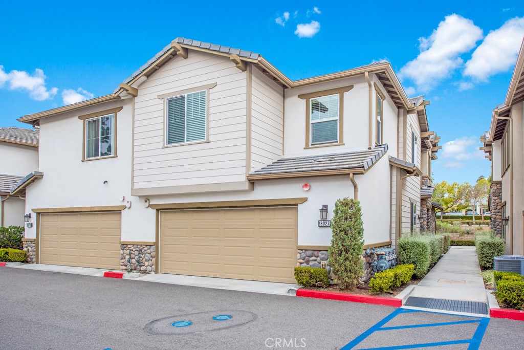 Welcome to the fantastic community of Covington Townhouses located in central Yorba Linda and within walking distance from the new Yorba Linda Town Center. This completely upgraded 4 bedroom, 3 bath, plus loft townhome is simply perfect. With designer colors and upgrades throughout this turnkey property, it is truly move in ready. Offering 1 bedroom and a 3/4 bathroom on the first floor, the room is perfect for guests or a home office. The kitchen is open directly to the family room, which is ideal for entertaining, and boasts a large breakfast bar. Upstairs the master suite offers gorgeous wood flooring along with an over-sized walk-in closet and also a large master bathroom with separate his-and-hers sinks and a soaking tub. The loft area offers a built-in desk space and is perfect as a workout space or secondary entertainment space. The additional guest rooms are large and both have large closets. The garage is complete with built-in storage cabinets and epoxy flooring. This community is conveniently located with easy access to dining, shopping, and offers quick freeway access for commuters.