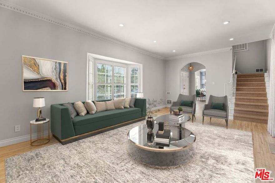 This stunning townhouse-style unit, located directly across from Roxbury Park, delivers a sophisticated living experience in an unbeatable location. Designer-done with top-of-the-line finishes, it features a true two-story floor plan with three bedrooms and 2.5 bathrooms. Highlights include beautiful park views, a private outdoor space with heaters, and an open layout ideal for entertaining. Conveniently located near world-renowned shopping, markets, restaurants, and coffee shops.***Photos have been virtually staged***