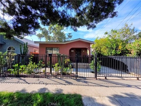 Photo of 5323 Latham St, Los Angeles, CA 90011 (MLS # NP26039480)