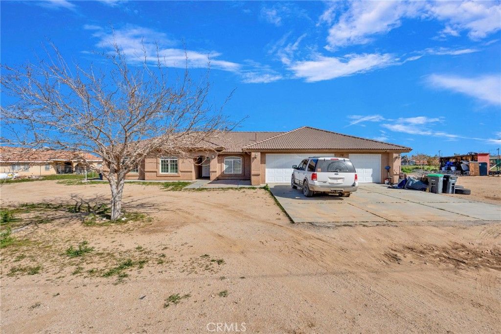 Photo of 12865 Barbet Road, Phelan, CA 92371 (MLS # CV26046861)
