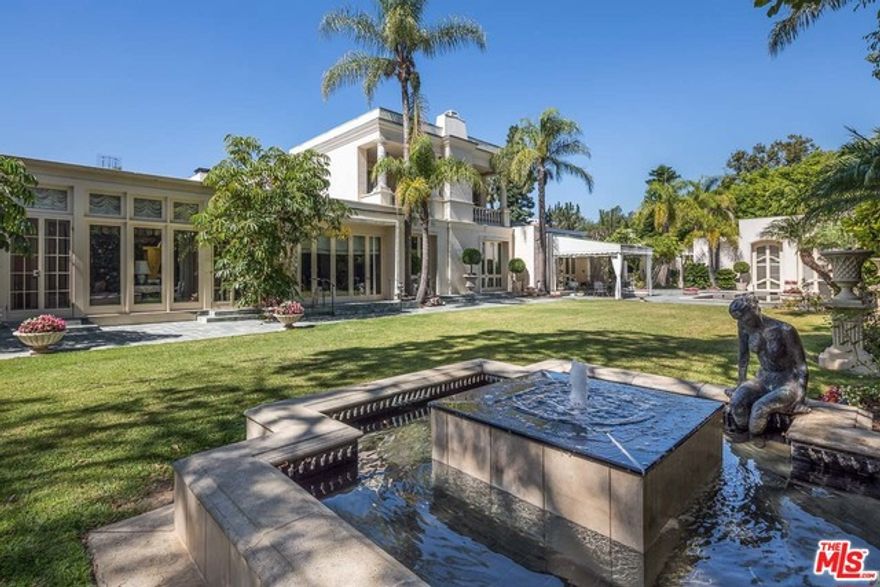 Neoclasical Italian Villa on the most sought-after street in Holmby Hills.  With high ceilings throughout, this prestigious property boasts a formal living room, library, and dining room, six bedrooms and nine baths, including an expansive first floor master suite opening onto the gardens.  The second story includes a private office, two large guest suites with views of the hills to Hollywood and a balcony overlooking the large pool and guest house.  ** Additional family room in the lower level which could also be a theater.