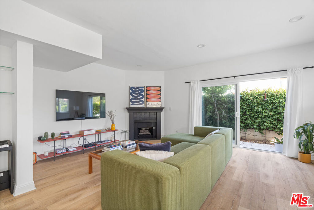 Beautiful 3-bedroom, 2.5-bath townhome with outdoor space! Located in a charming 5-unit building in the heart of Santa Monica, just seconds from Virginia Avenue Park and the weekly Farmers Market. This bright and spacious front unit features an open-concept living and dining area with great natural light, flowing out to two private patios perfect for entertaining or relaxing. Upstairs offers a generous primary suite with a skylight and walk-in closet, two additional bedrooms, a full bath, laundry area, and bonus attic space. The home also includes AC & three gated, covered, side-by-side parking spots a rare find on the westside. Enjoy the best of Santa Monica living with parks, shopping, and the beach! A must see!!