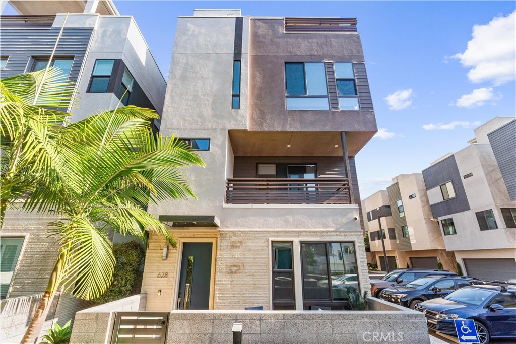 Coastal Luxury Meets Modern Design! Just about a mile from the beach, this stunning high-end condo in the heart of Costa Mesa delivers the ultimate Southern California lifestyle. Surrounded by top-tier dining, boutique shopping, and vibrant nightlife, this residence is a rare blend of location, sophistication, and comfort.
Step into a sun-drenched open floor plan featuring soaring ceilings, wide-plank wood flooring, and designer finishes throughout. The chef’s kitchen is the centerpiece, boasting custom cabinetry, quartz countertops, and premium stainless steel appliances. The elegant primary suite offers a spa-inspired bath, dual vanities, and a generous walk-in closet.
One of the home’s most exceptional features is the expansive top-floor outdoor living area — approximately 800 sq ft of partially covered space perfect for entertaining, lounging, or enjoying coastal sunsets and ocean breezes. Whether you envision rooftop dining, a garden retreat, or a private outdoor lounge, this space is unmatched in style and flexibility.
Complete with secure parking, in-unit laundry, and a low-maintenance, lock-and-leave lifestyle, this condo is coastal Orange County living at its finest. Don’t miss this rare opportunity to own luxury so close to the sand.