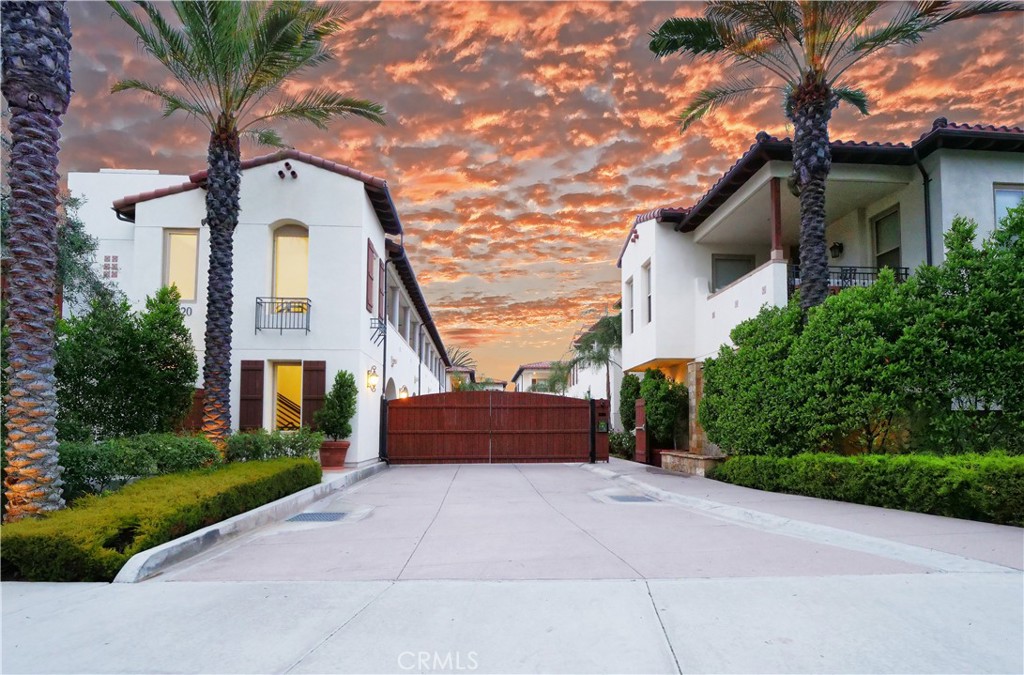 Welcome to this beautifully updated two-bedroom, two-bath condo, tucked inside a secure gated community and designed with modern living in mind. Built in 2015 and thoughtfully refreshed over the last two years, this home blends contemporary style with everyday comfort.
Step inside to a light-filled open-concept living area featuring wide-plank hardwood floors, recessed lighting, and a stunning fireplace with stone surround and rustic wood mantel. The chef’s kitchen boasts new quartz countertops, stainless steel appliances, freshly painted cabinetry, and a designer Fontaine by Italia faucet. An adjoining dining space, complete with an elegant chandelier, sets the stage for both casual meals and entertaining.
The primary suite is a private retreat with direct patio access, a custom-organized closet, and spa-inspired bath featuring a double vanity, travertine walk-in shower, and frameless glass doors. The spacious secondary bedroom offers flexibility as a guest room, home office, or creative studio.
Additional features include in-unit laundry with storage, dual-pane windows, central air, a security system, fresh interior paint, and multiple smart storage solutions.
Community amenities elevate your lifestyle with a dog run, putting green, BBQ area, and cozy fire pit. Ideally located near The Peninsula Center, top-rated schools, local parks, beaches, and freeway access—this home delivers style, comfort, and convenience in one perfect package.