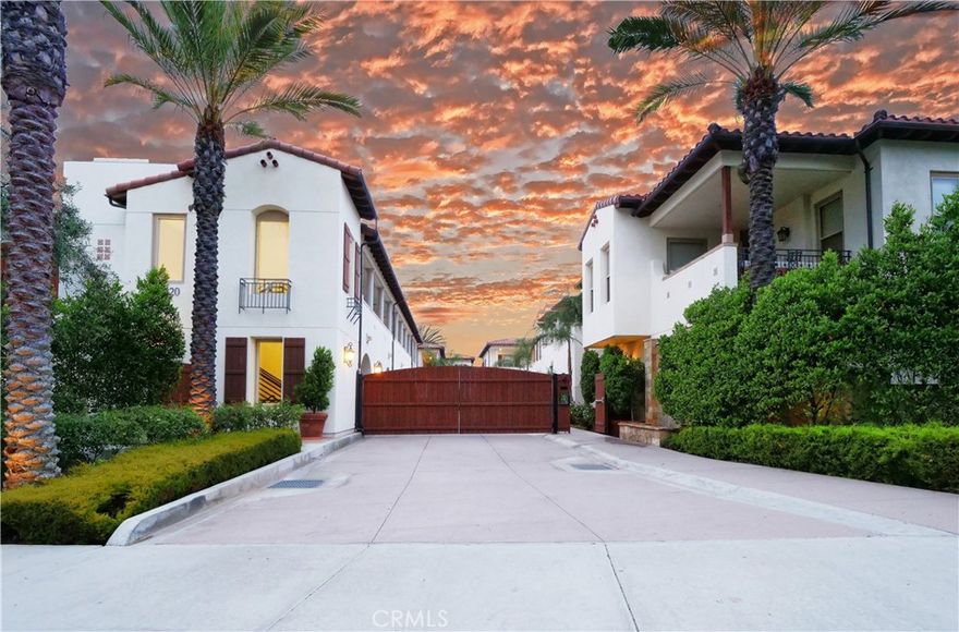 Welcome to this beautifully updated two-bedroom, two-bath condo, tucked inside a secure gated community and designed with modern living in mind. Built in 2015 and thoughtfully refreshed over the last two years, this home blends contemporary style with everyday comfort.



Step inside to a light-filled open-concept living area featuring wide-plank hardwood floors, recessed lighting, and a stunning fireplace with stone surround and rustic wood mantel. The chef’s kitchen boasts new quartz countertops, stainless steel appliances, freshly painted cabinetry, and a designer Fontaine by Italia faucet. An adjoining dining space, complete with an elegant chandelier, sets the stage for both casual meals and entertaining.



The primary suite is a private retreat with direct patio access, a custom-organized closet, and spa-inspired bath featuring a double vanity, travertine walk-in shower, and frameless glass doors. The spacious secondary bedroom offers flexibility as a guest room, home office, or creative studio.



Additional features include in-unit laundry with storage, dual-pane windows, central air, a security system, fresh interior paint, and multiple smart storage solutions.



Community amenities elevate your lifestyle with a dog run, putting green, BBQ area, and cozy fire pit. Ideally located near The Peninsula Center, top-rated schools, local parks, beaches, and freeway access—this home delivers style, comfort, and convenience in one perfect package.