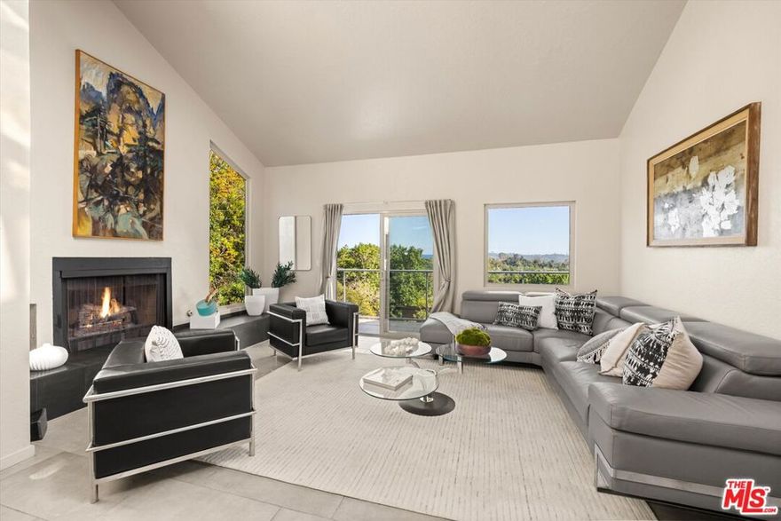 Turnkey modern home with a view! Nestled in Mission Canyon Heights, this retreat boasts wide vistas with three bedrooms and three bathrooms across two spacious levels. It features the convenience of two primary suites, one on each floor. The home has been thoughtfully designed with unique architectural elements, vaulted ceilings, and numerous skylights that fill the space with natural light, creating a bright and inviting atmosphere. Like to entertain? There is a very large deck above the two-car garage, perfect for hosting gatherings, enjoying outdoor dining, or simply relaxing and taking in the enchanting city views from multiple vantage points. The location offers an excellent combination of style and convenience, situated in the Roosevelt Elementary School attendance area and just minutes away from popular Santa Barbara attractions like the Old Mission, the Rose Garden, Downtown, and the Museum of Natural History.
