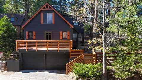 Photo of 610 Clubhouse Dr, Twin Peaks, CA 92391 (MLS # CV25267140)