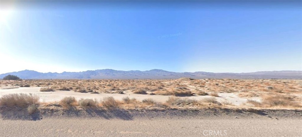 This 9.7-acre parcel on Silver Valley Rd in Newberry Springs, California, offers a rare opportunity to create your ideal desert retreat. Set in a tranquil area, the land is perfect for building a custom home with ample space for gardens, a workshop, or even a guest house.
Whether you envision a modest abode or a grand architectural wonder, this expansive lot in Newberry Springs is an excellent setting where dreams have the space to grow. Seize the opportunity to develop something truly special from the ground up, where your vision can take root and flourish.
The adjacent lot is also available and NOT included with the sale of this 9.7 acre lot. Please contact 949-633-2252 for more information.