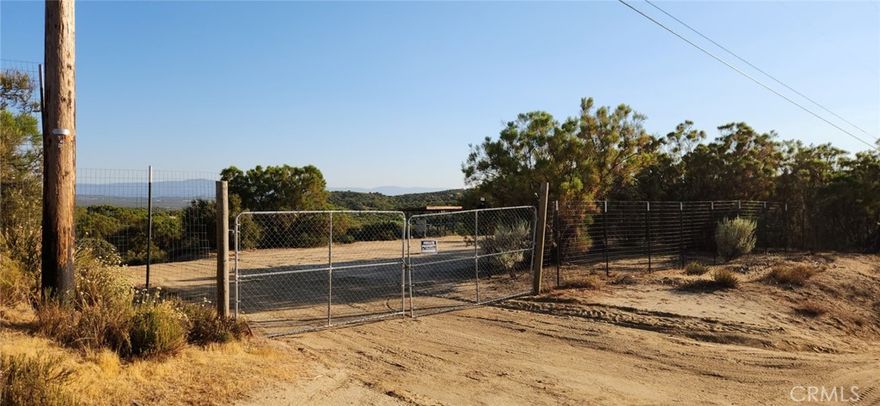 A beautifully 2.5 acre property with views of Mt Cahuilla, Mt Palomar, Mt Santa Rosa, Mt Thomas and Mt San Jacinto. Situated in the area Just below Mt Cahuilla at just under 4000' elevation you get to enjoy all for seasons. The snow normally falls a few times a year. Temecula is about 35 minutes away and Palm Desert 45 minutes so your not to far from all the major stores and amenities you might need. The property is completely fenced in and has just been graded. There are a few flat areas for a potential future home site and plenty of gardening areas. There is a 40' shipping container for storage or what ever you want (tiny home). A new well pump and hardware was installed in the well in 2019. A utility pole with power is located next to front get at the corner of the property for easy access and a short distance to the well. With plenty of dirt roads and trails this place is perfect for dirt biking, horse back riding or hiking in the local mountains.