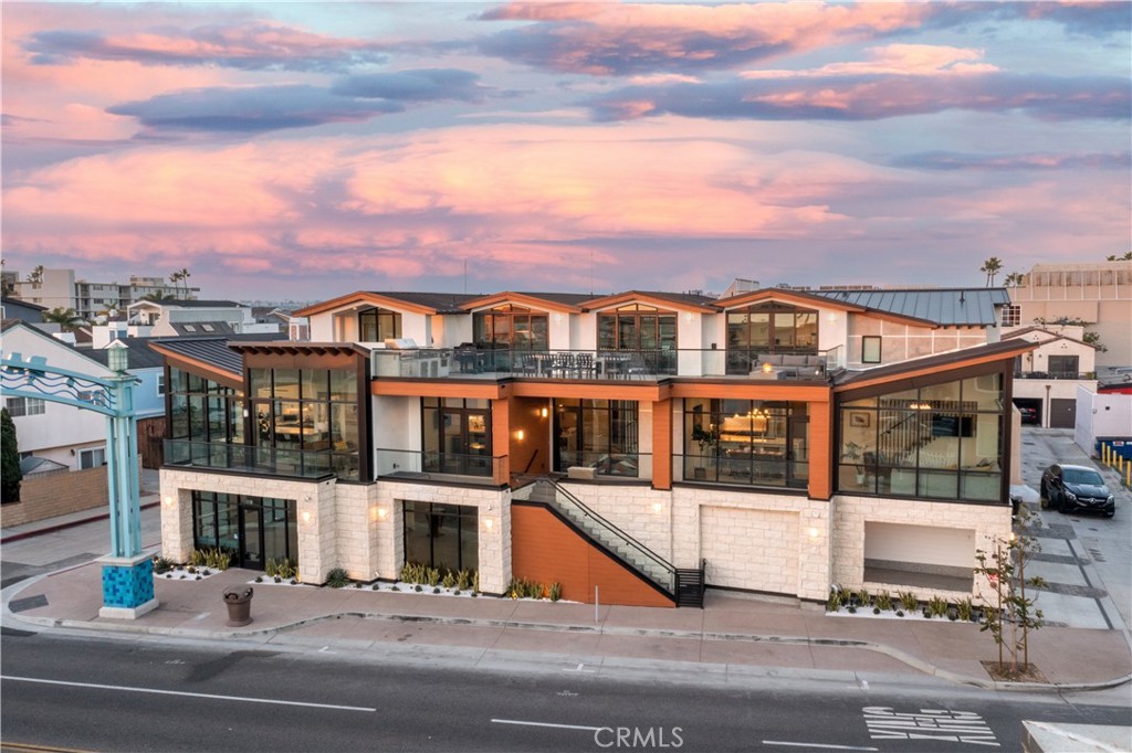 Experience the ultimate in coastal luxury at 502 East Balboa Boulevard. Fully furnished 30 day minimum—an impeccably designed contemporary retreat nestled in the heart of Newport Beach. Just steps from the sand, bay, Balboa Island Ferry, and the iconic Fun Zone, this modern 3-bedroom, 2-bath home offers the perfect blend of elegance, comfort, and convenience for those seeking an elevated beach lifestyle.
Step inside to find a bright and airy open-concept living space featuring clean lines, sleek finishes, and high ceilings throughout. The gourmet kitchen is outfitted with top-of-the-line Dacor appliances, quartz countertops, and custom cabinetry—perfect for culinary enthusiasts and entertaining guests. The adjacent dining and living areas flow seamlessly, creating a warm and inviting environment for both relaxing and socializing.
Unwind in the luxurious king-size primary suite with spa-inspired en-suite bathroom and custom-built closets. The second bedroom features a plush queen bed, while the third room offers a versatile Murphy bed setup that easily converts into a home office or guest room.
For movie nights or rainy day retreats, enjoy your very own private theater room—fully equipped and ready for immersive cinematic experiences. Head up to the expansive rooftop deck to take in breathtaking sunsets, unwind in the private jacuzzi, or host memorable gatherings with views of the coastline and city lights.
Additional amenities include central air conditioning, in-unit washer/dryer, a 2-car garage with ample storage, and smart home features for modern convenience. Whether you're entertaining, working remotely, or simply enjoying the sunshine, this home is designed to fit every need.