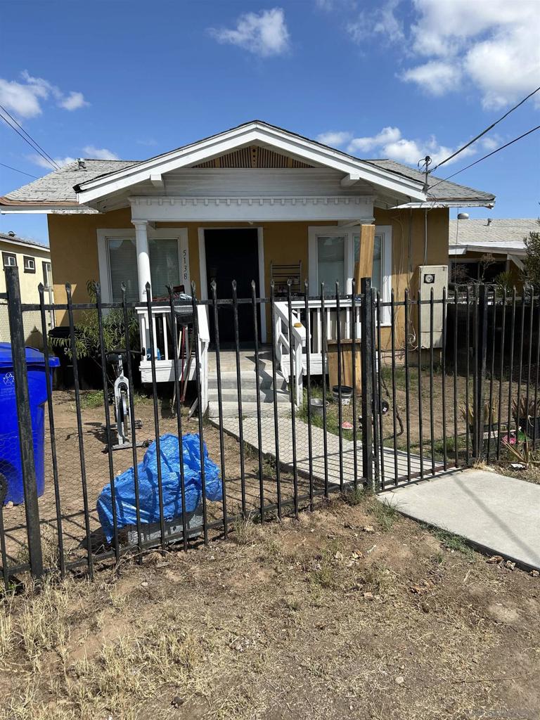 Three separate houses on large lot with SIX OFF STREET PARKING SPACES. Two units need cosmetics due to long term tenants and one unit with fresh paint and rent ready! Front house is 2 bedroom/1 bath and freshly painted and back patio space/second house is 2 bedroom/1 bath/back house has 3 bedrooms and 1 1/2 bath with large covered patio and private backyard. Great location within walking distance of trolley! So much potential here!