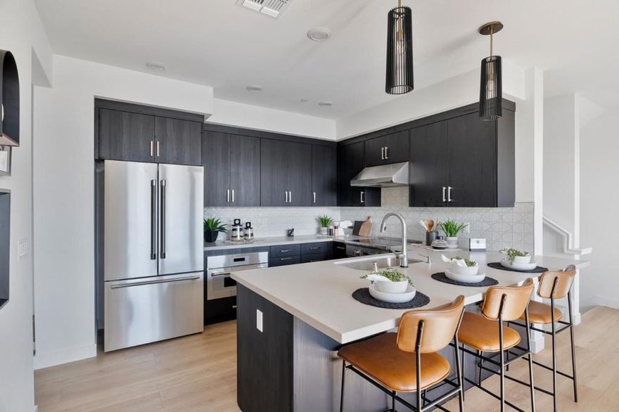 Brand new construction! Lot 39, Plan 5 is a 3-bedroom, 3 bathroom boasting 1,618 square feet of living space designed for modern living. Spread across two floors, the home offers views and abundant natural light. The heart of the home is the open floor plan on the third floor, seamlessly integrating the kitchen, living room, bedroom, full bathroom, and deck, all with plenty of room for entertaining. The kitchen features a Bosch appliance package and gorgeous quartz countertops, while the island provides a convenient spot for food preparation or casual dining. Two additional bedrooms are located on the fourth floor, ensuring privacy and tranquility. Both bedrooms boast views, making them the perfect retreats after a long day.  Vida is a new collection of 50 two- and four-bedroom energy-efficient townhomes. Open floor plan designs range from approximately 1,378 to 2,037 square feet. Vida's central location is within walking distance of shopping and dining, as well as Fremont High School and the Sunnyvale Community Center Park. Please note that the images are artist renderings and do not reflect the actual home for sale.