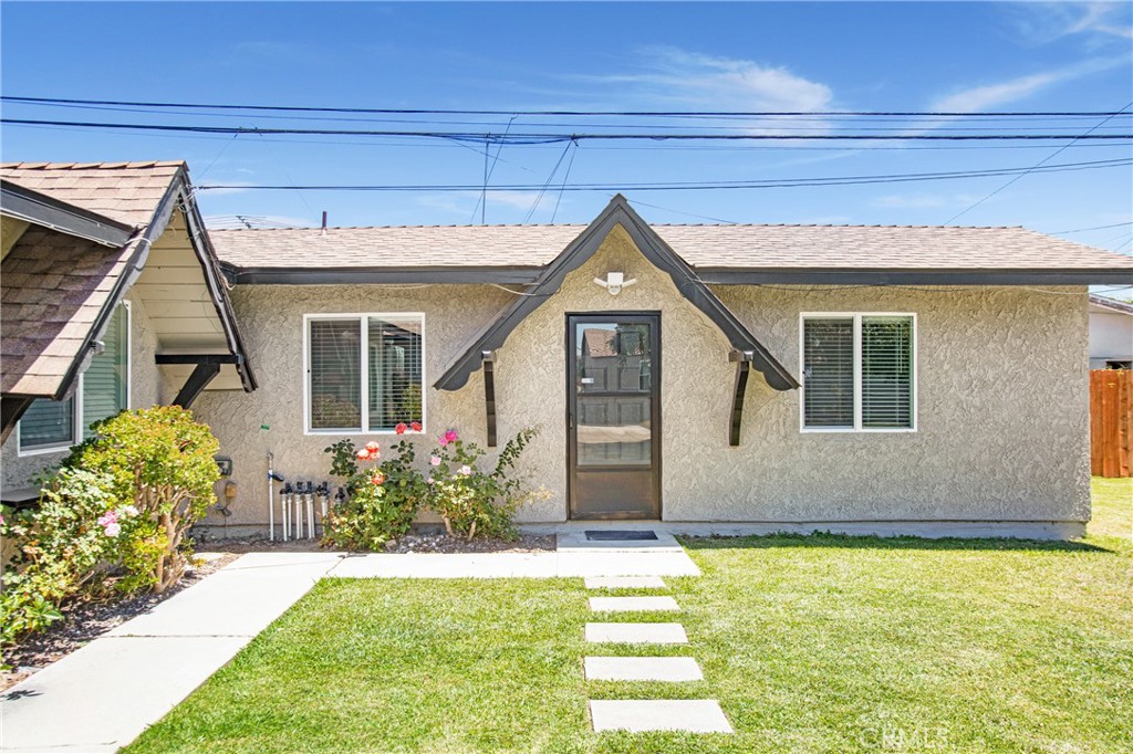 Beautifully remodeled 2 bed, 1 bath home in Paramount unit with approx. 700 sqft with Detached garage. Unit has been completely remodeled with new plumbing, electrical, flooring, fixtures, paint, quartz countertops, new stainless steel microwave and dishwasher & fridge, new stackable washer & dryer (to be installed prior to move in) Bathroom has new tub/tile, all new fixtures. Unit comes with new heating and central air conditioning and nice big front and back fenced in yard. Located within Walking distance to Lincoln Elementary, close to the 91, 710 and 105 freeways.